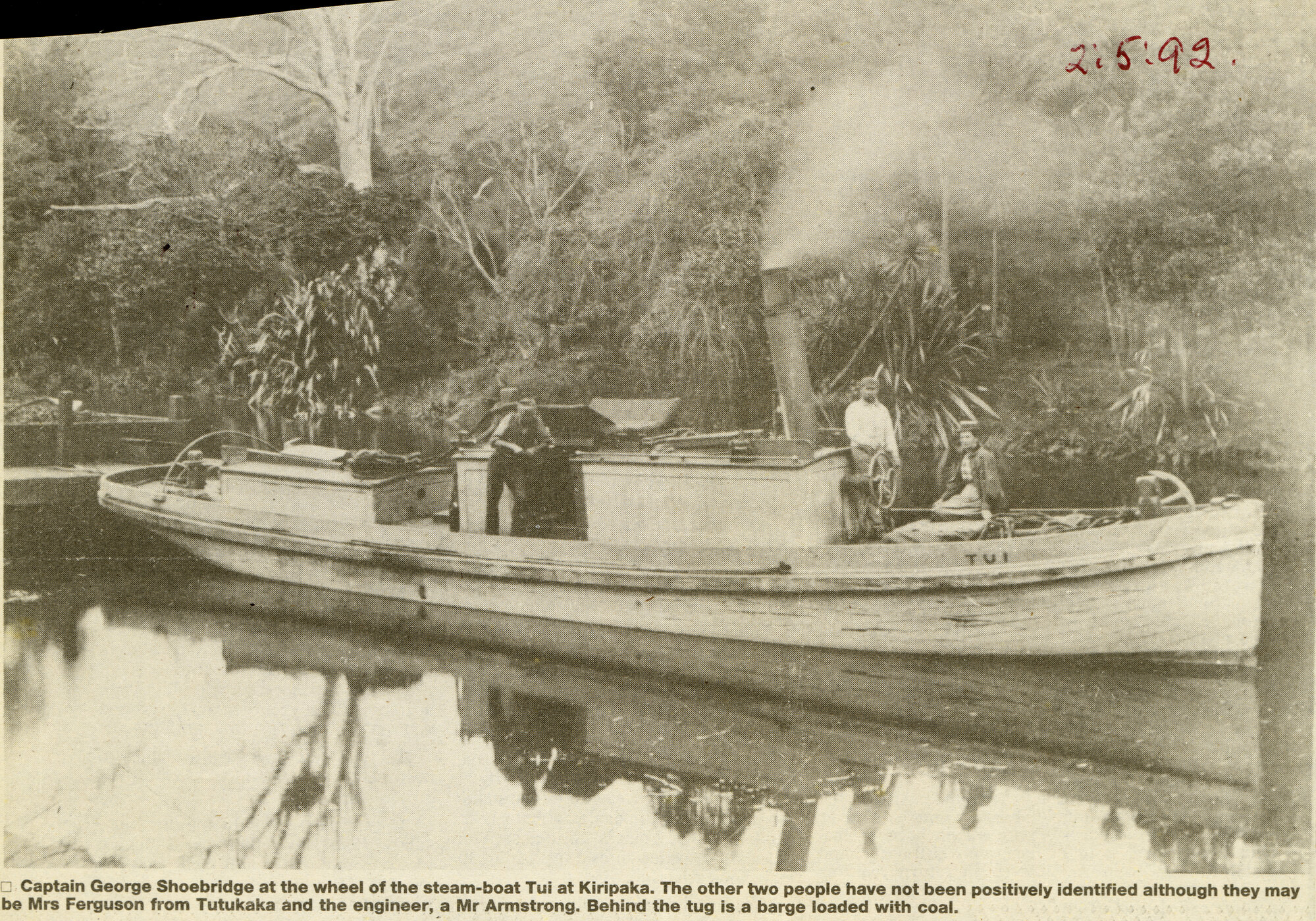 Captain George Shoebridge at the Wheel of the Steamboat Tui at Kiripaka