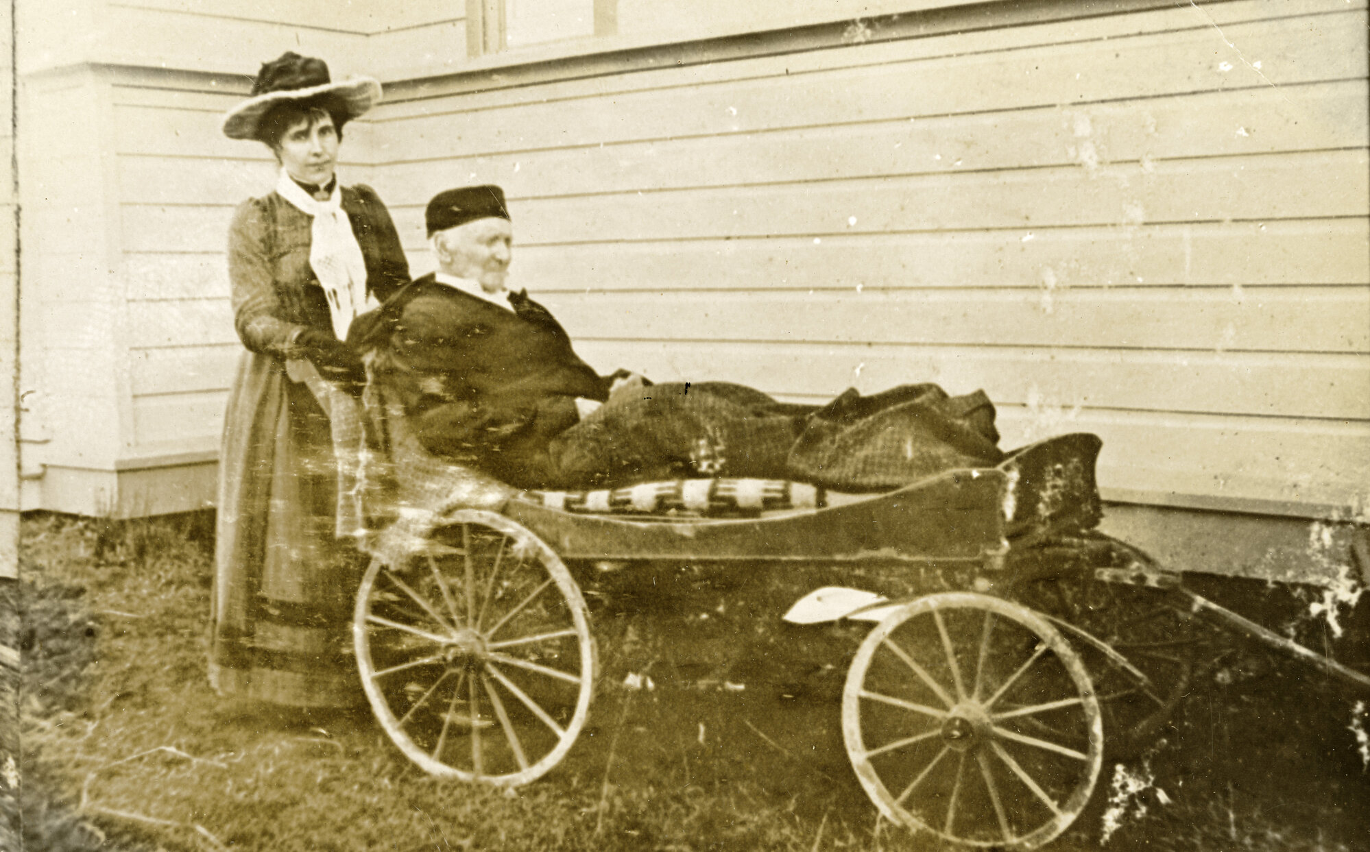 Reverend Joseph Matthews &amp; Grand-daughter Eva Matthews outside Saint Saviours Church