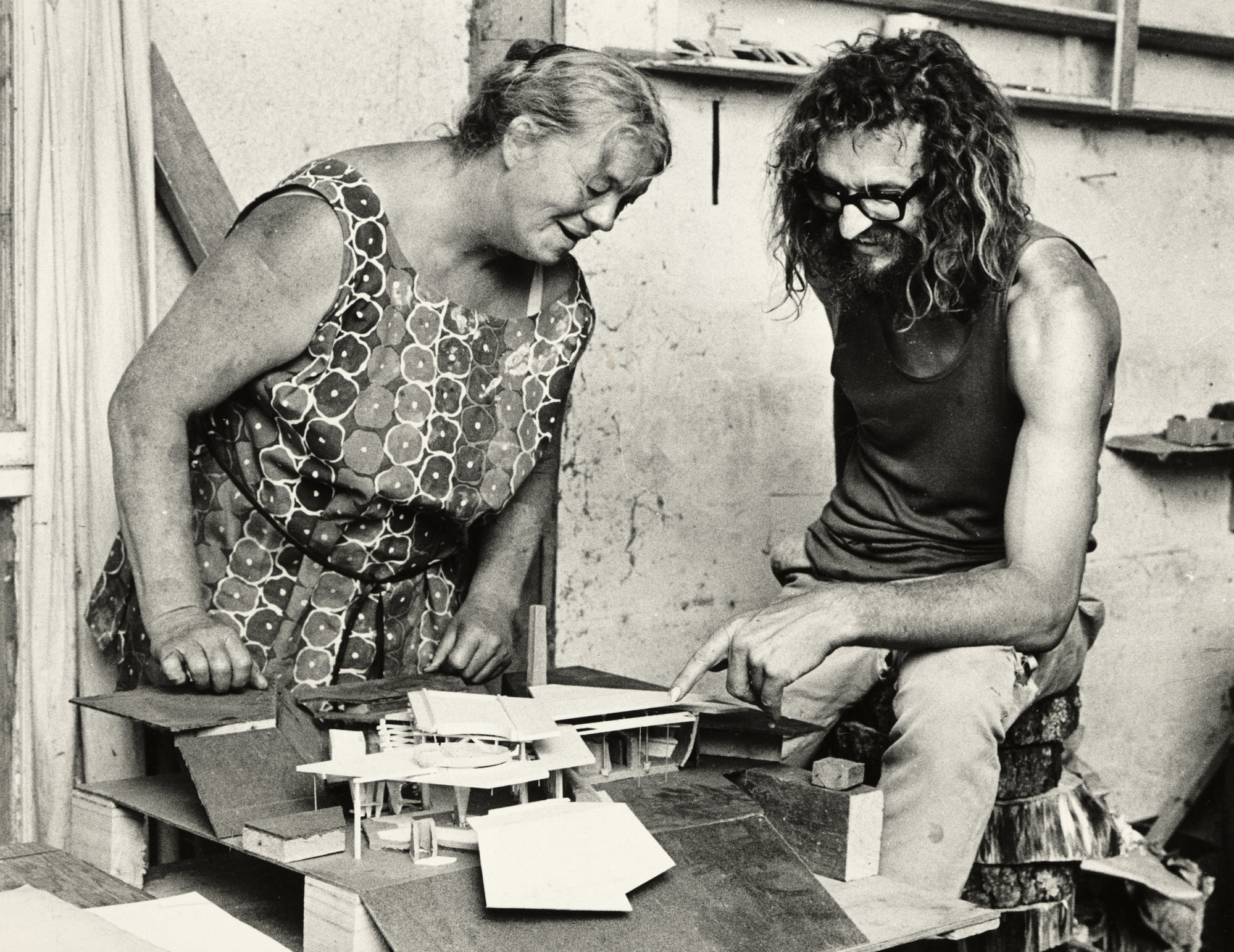 Yvonne Rust Looking Over Architectural Model