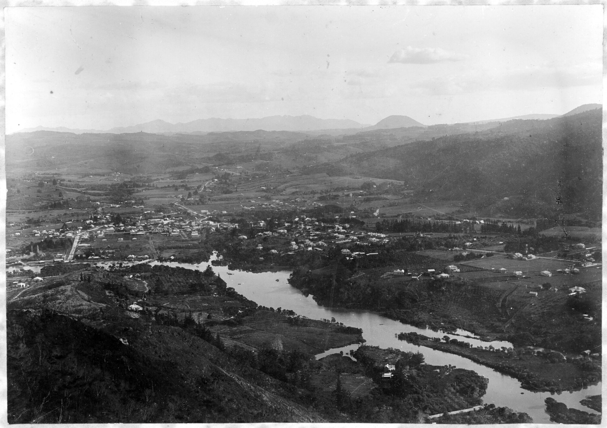 Settlement, hills and river panorama
