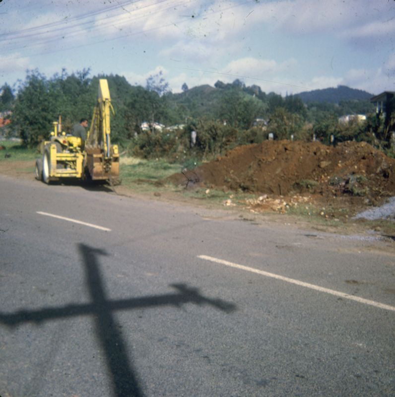 Digger on main hire line at Res.