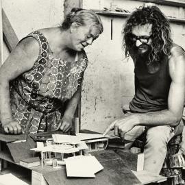 Yvonne Rust Looking Over Architectural Model
