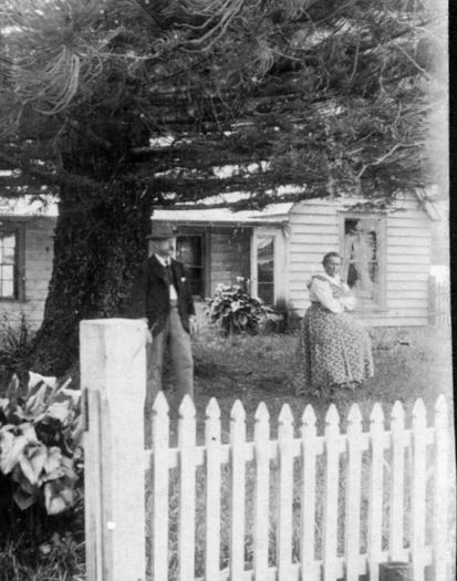 Peter Sturt Brown (standing) and Annie Mary Brown (seated) outside their home at Ngunguru 
Whangarei Libraries Recollect  wdc.recollect.co.nz  